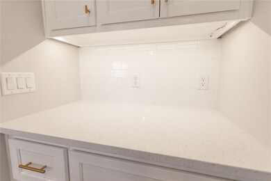 Room details featuring white cabinets