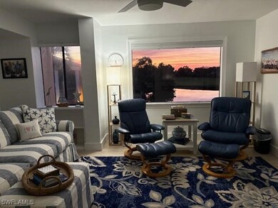 Living area featuring ceiling fan