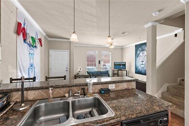 Kitchen featuring black dishwasher, ornamental mol