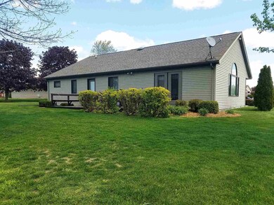 Rear of home with large deck.
