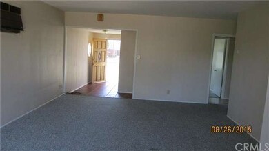 Living room facing towards entry