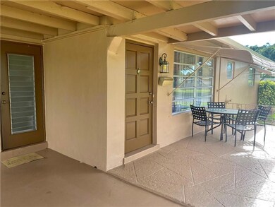 Carport has additional entry to laundry room