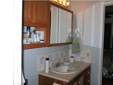 Bathroom with large medicine cabinet with mirror