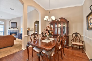 Inviting formal dining area ~Note the wood flooring ~