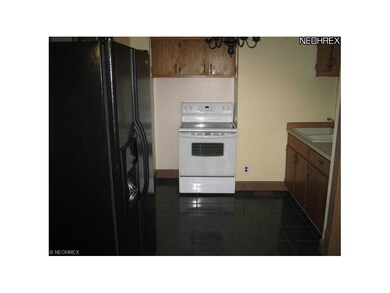 The eat-in kitchen has ample room for a re-design 