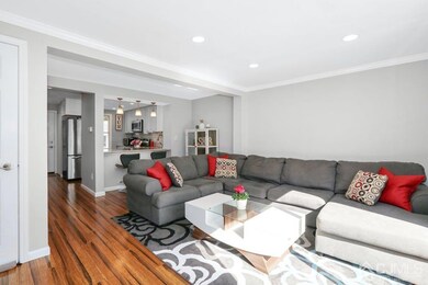 Living Room with view into Kitchen