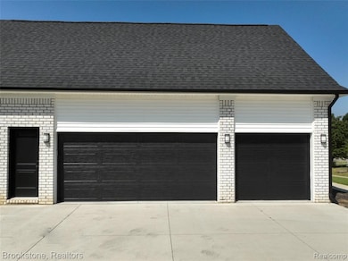 3 car garage with service entry door