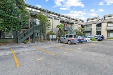View of building exterior with stairs, uncovered 
