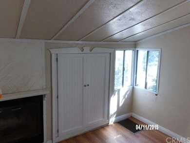 BEDROOM AND LIVING ROOM.