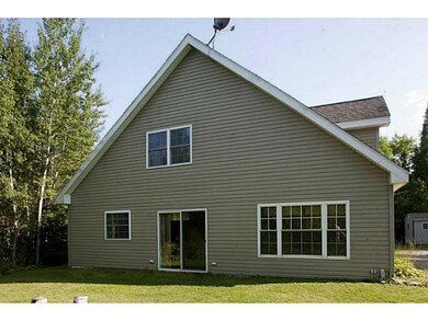 Exterior Side View. Sliding glass...