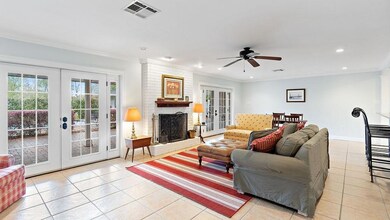 Large living area with dining room to side