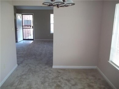 Seperate dining room with new carpet & fresh paint