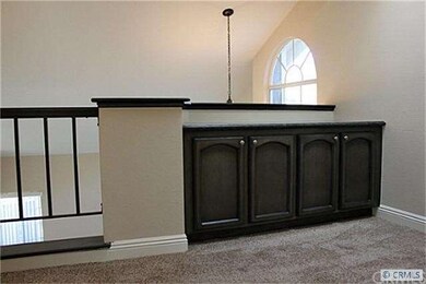 Upstairs cabinetry with granite