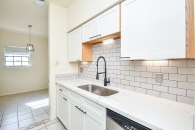 Another view of the kitchen and breakfast room