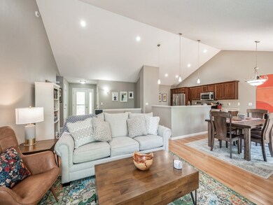 Open living room, dining area & kitchen