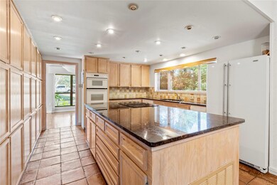 Kitchen featuring plenty of natural light, light b
