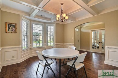 Coffered ceiling and hardwood floors in the Formal