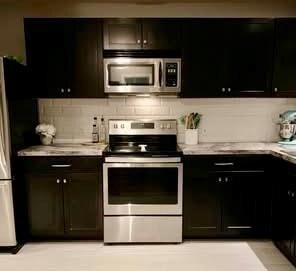 Kitchen with appliances with stainless steel fini