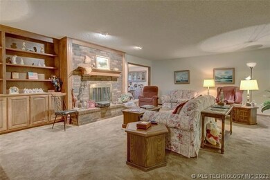 Spacious Living room!  Fireplace, and Book Shelve