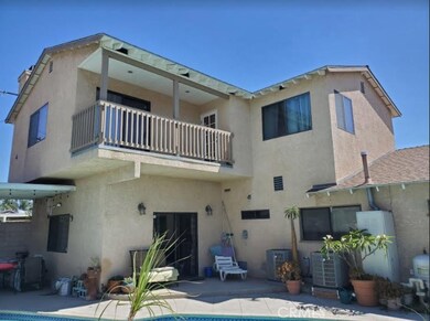 Back Yard with Master Bedroom Balcony over looking Pool