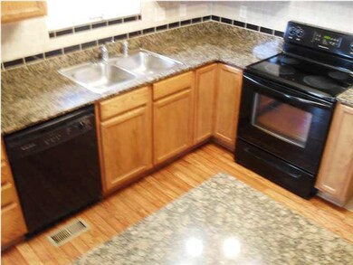 Here's another view of the kitchen and granite cou