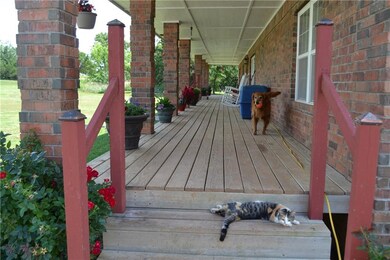 Front Porch is full length of house.