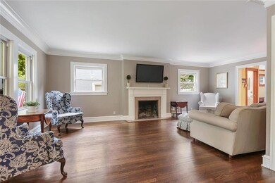 Overized living room with tons of light and beauti