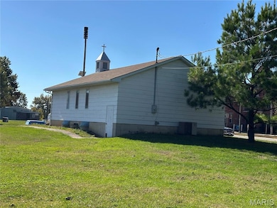 View of home's exterior featuring a yard