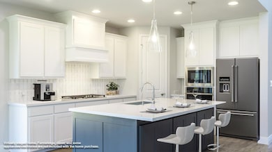 Kitchen with appliances with stainless steel fini