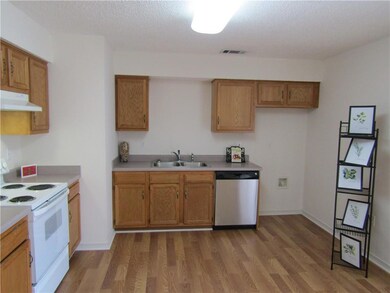 Additional kitchen view, notice those new floors a
