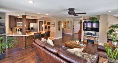 Spacious Living Room with Recessed Lighting and Ce