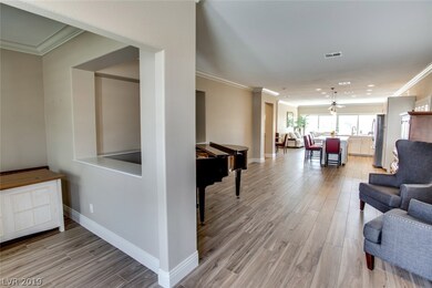 Enter into formal living room with office/den to t