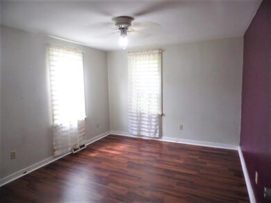 THIS 2ND BEDROOM INCLUDES A LIGHTED CEILING FAN. I