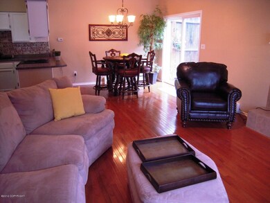 New wood flooring living/dining/kitchen