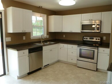 Kitchen - New Cabinets, New Stainless Steel Appliances, New Sink & Faucet, New Lighting, New Flooring, Freshly Painted