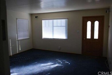 Living room looking towards front door.