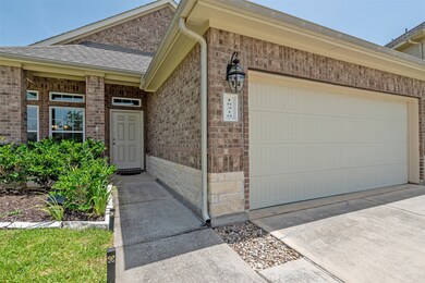This front porch is stunning with its rich tones of the brick over the contrasting limestone.
