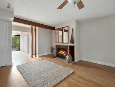 Living room opens into the sunroom