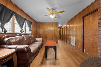 Living space with access to the bedrooms.