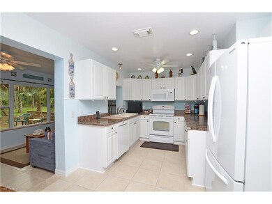 Kitchen opens up to the Florida Room