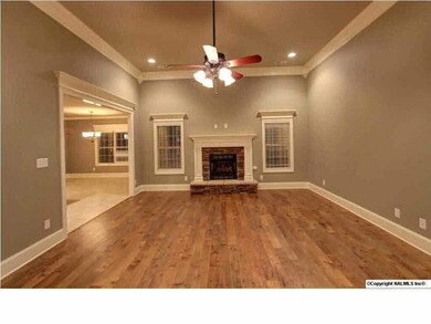 Entertainment sized kitchen every cook is sure to enjoy. Granite counter tops, custom cabinets, double oven, gas range, tiled floors, recessed lighting and glass tiled backsplash.