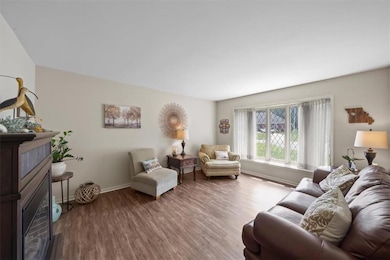 Formal living room that could serve as a great office with tons of natural light.