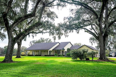 Surounded by beautiful live oaks gives privacy and the 