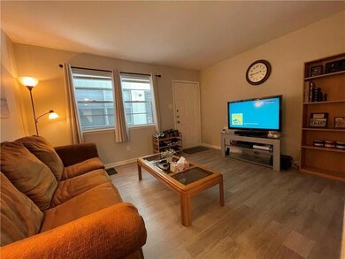 Living area with wood finished floors