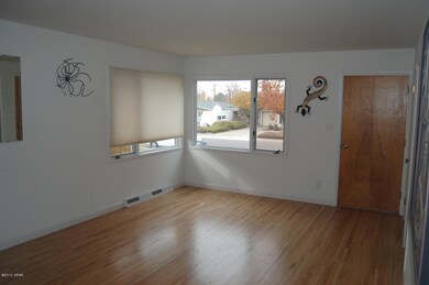 living room with picture windows