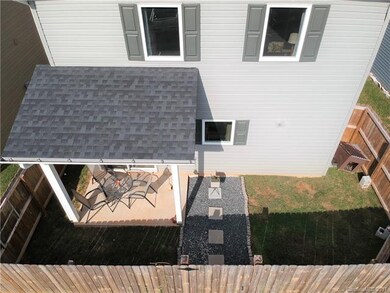 Aerial View of Fenced Area and Back Porch