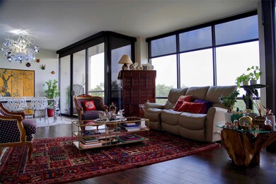 The open layout with the living and dining spaces