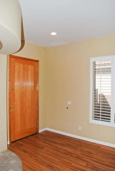 FOYER W/ HI-END LAMINATE FLOORING!
