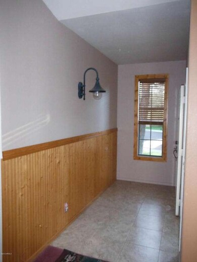 Front Entry with Wainscoting and Tile