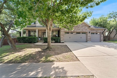 Obstructed view of property featuring a garage, d